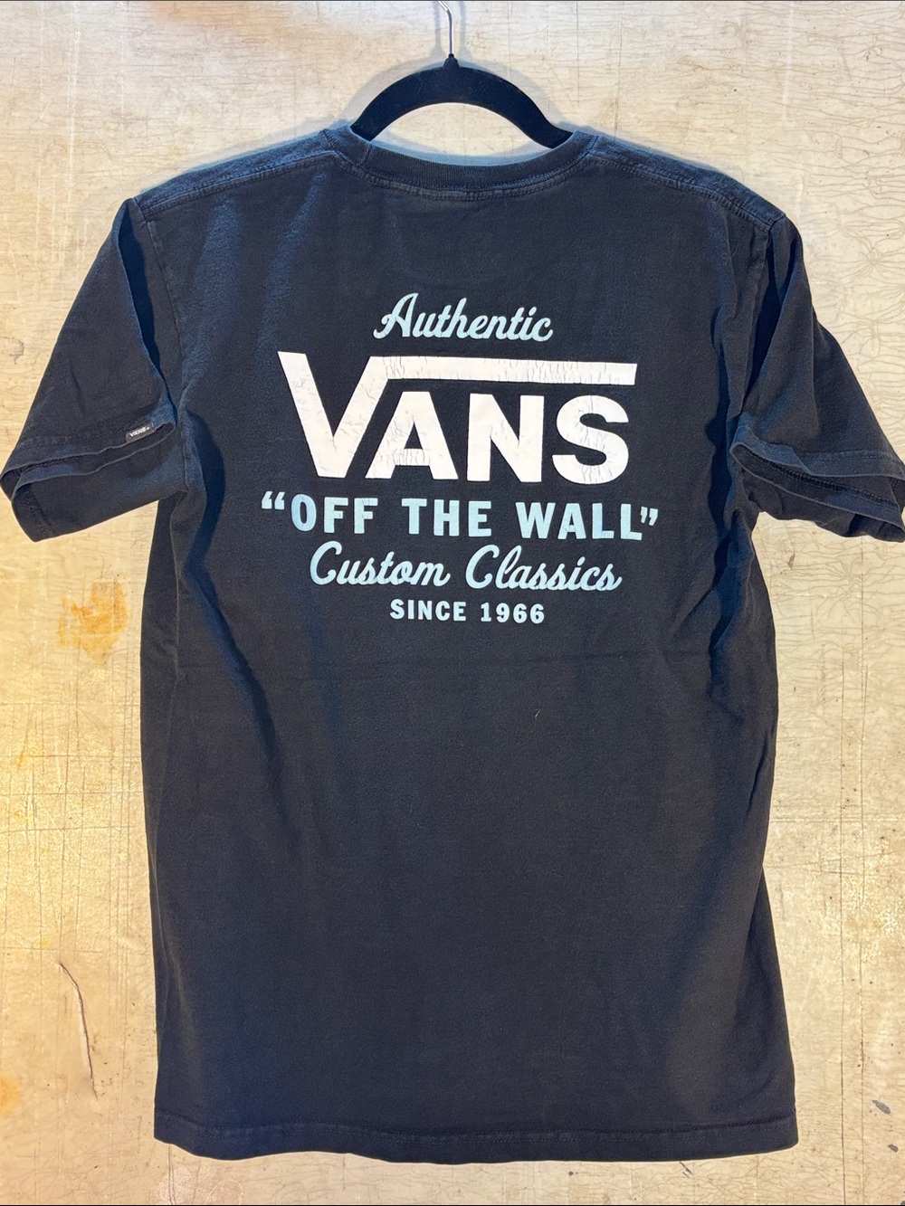 Vans Black Short Sleeve Tee with White 'Off The Wall' Chest Logo